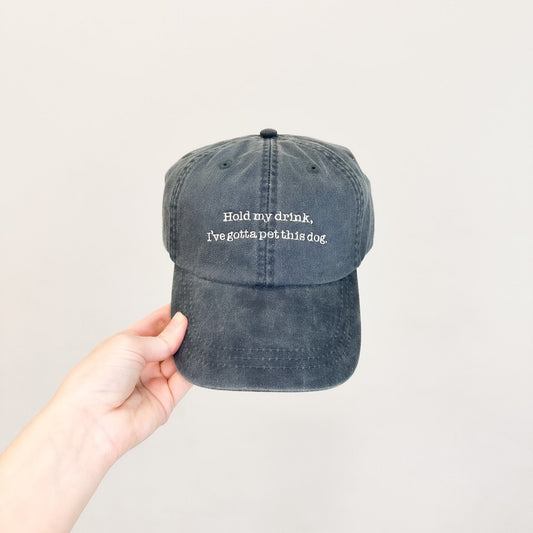 Hold My Drink, I Gotta Pet This Dog Embroidered Pigment-Dyed Baseball Cap (Typewriter Font) - Adult Unisex